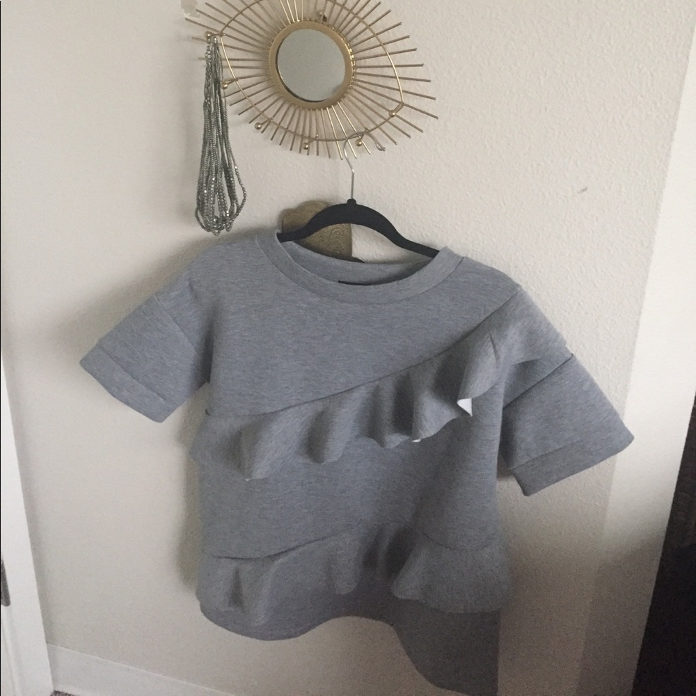 Asymmetrical ruffled gray top